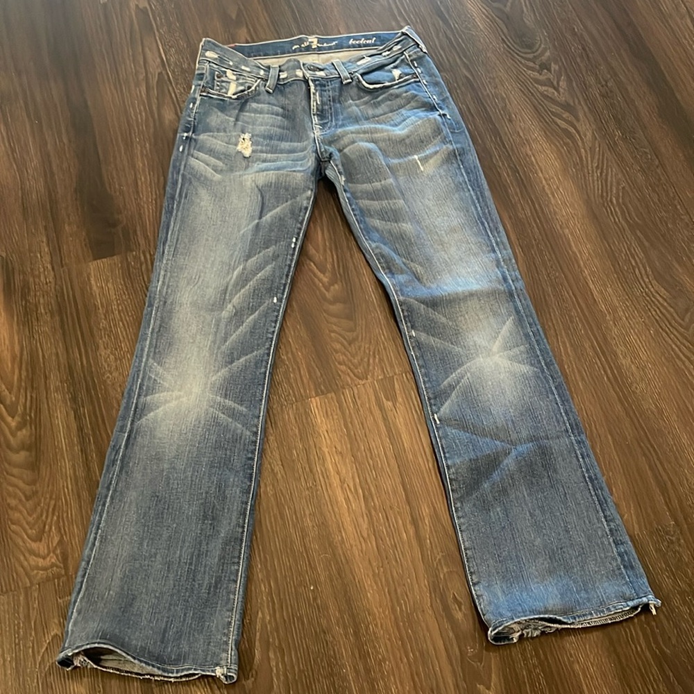 Bootcut blue ripped jeans in perfect condition